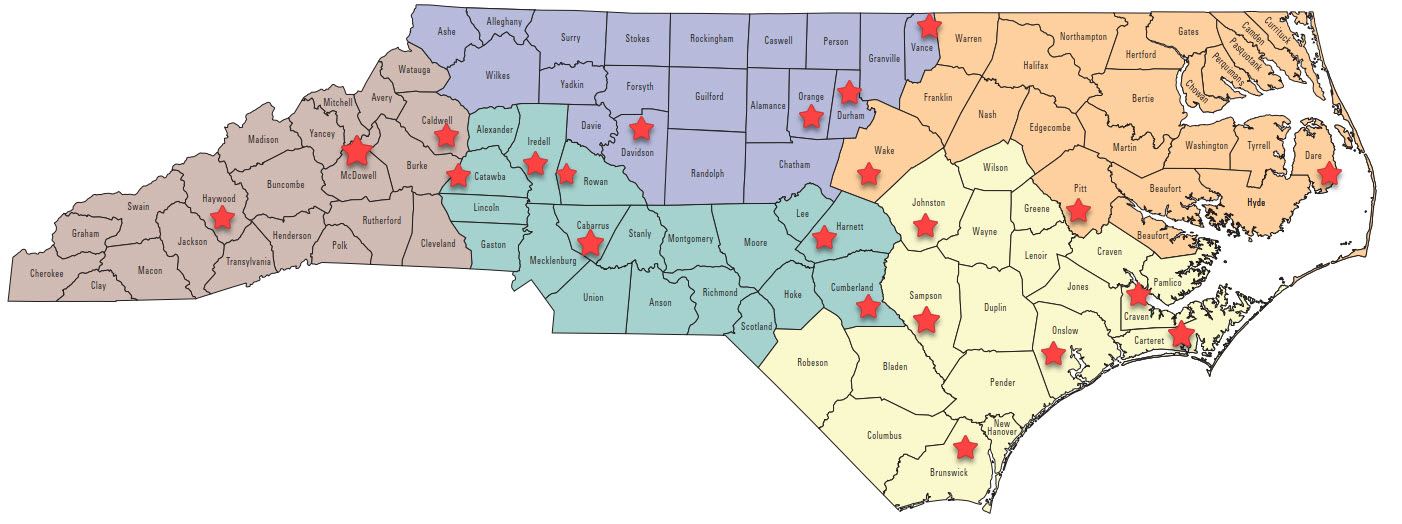 Map of North Carolina counties, with red stars placed in counties that received NCEMGVA Project Grants in 2022